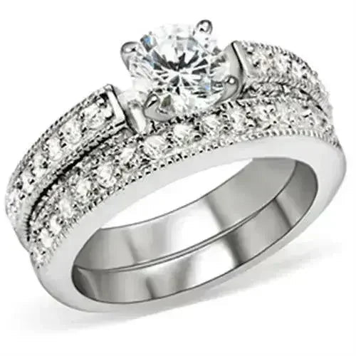 5X016 Rhodium Brass Ring – 6.5mm AAA Clear CZ Solitaire (Bold & Brilliant)