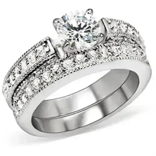 5X016 Rhodium Brass Ring – 6.5mm AAA Clear CZ Solitaire (Bold & Brilliant)